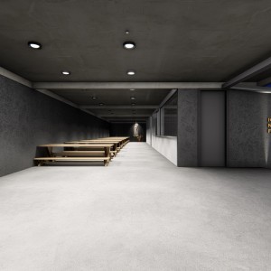 Vista de noite do salão de festas da comunidade. (Ar:Co – Arquitetura Cooperativa).