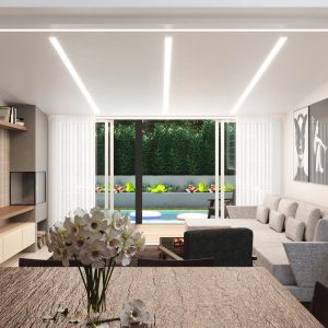 Vista da Sala de Jantar para a Sala de Estar. (Ar:Co – Arquitetura Cooperativa).