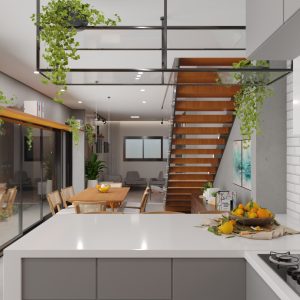 Vista da Cozinha para a Sala de jantar e Estar integradas. (Ar:Co – Arquitetura Cooperativa).