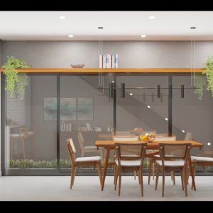 Vista da Sala de Estar para a Sala de jantar e Cozinha integradas. (Ar:Co – Arquitetura Cooperativa).