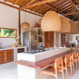 Vista da Cozinha para a Piscina. (Ar:Co – Arquitetura Cooperativa).